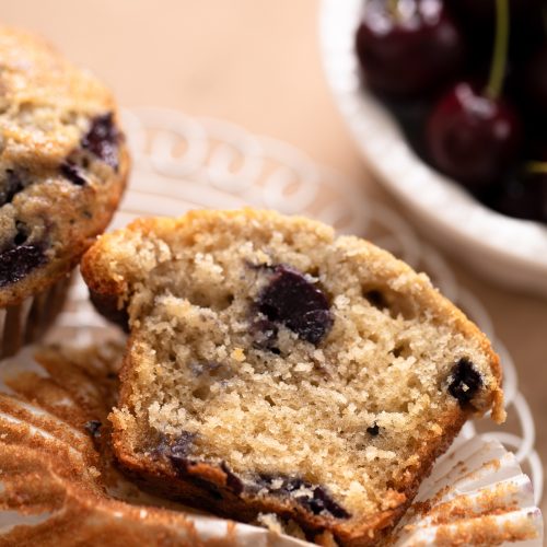 A close-up texture shot showcasing the soft, moist crumb of my cherry muffins. | Beat Bake Eat
