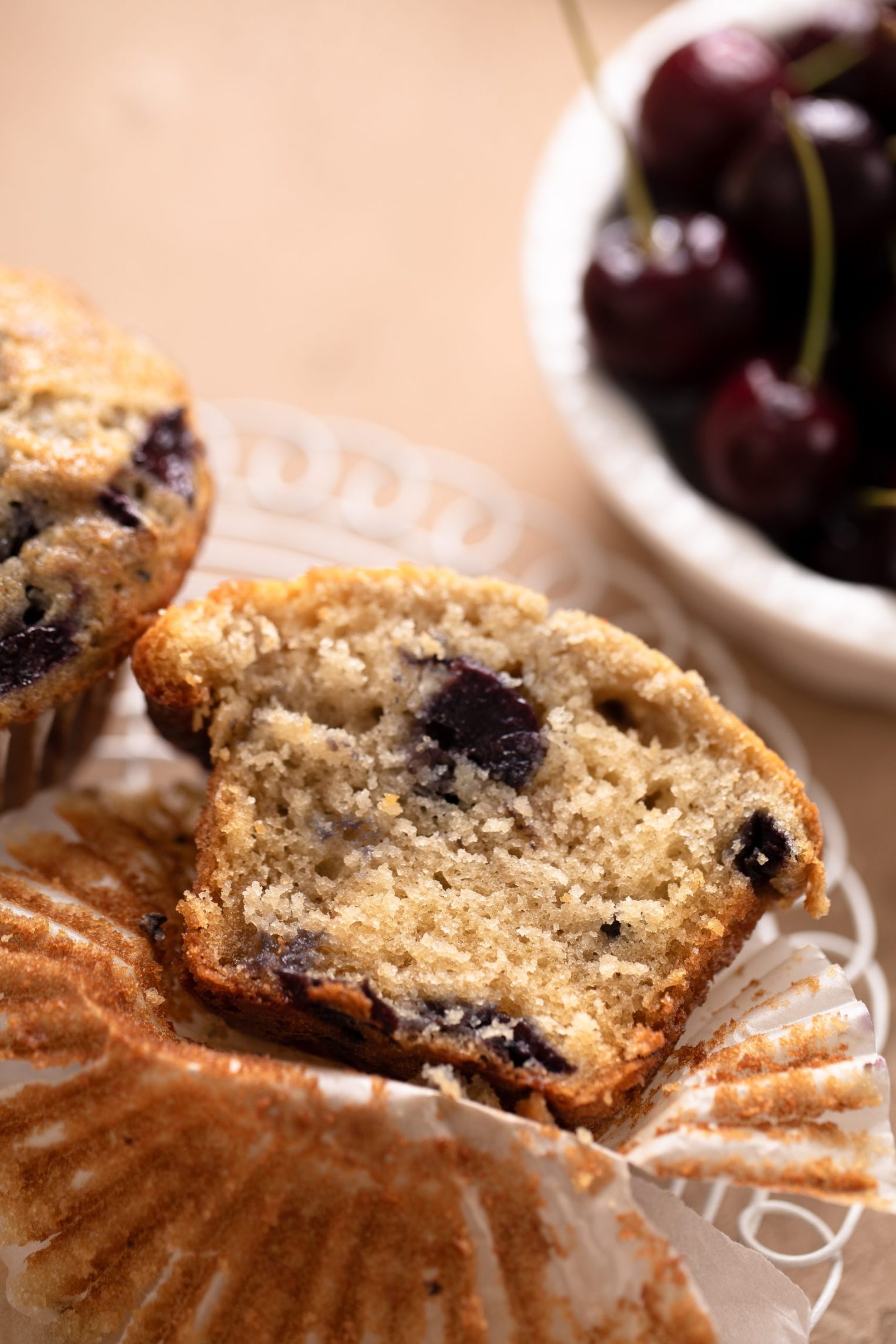 A close-up texture shot showcasing the soft, moist crumb of my cherry muffins. | Beat Bake Eat