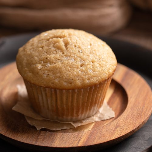 A close-up shot of a plain muffin. | Food Photography