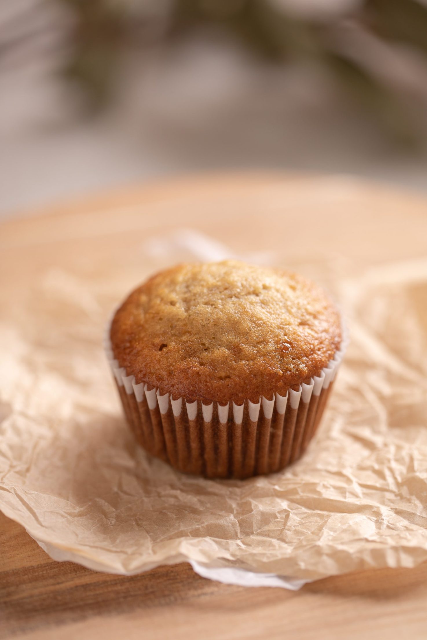 A banana muffin on a stand.